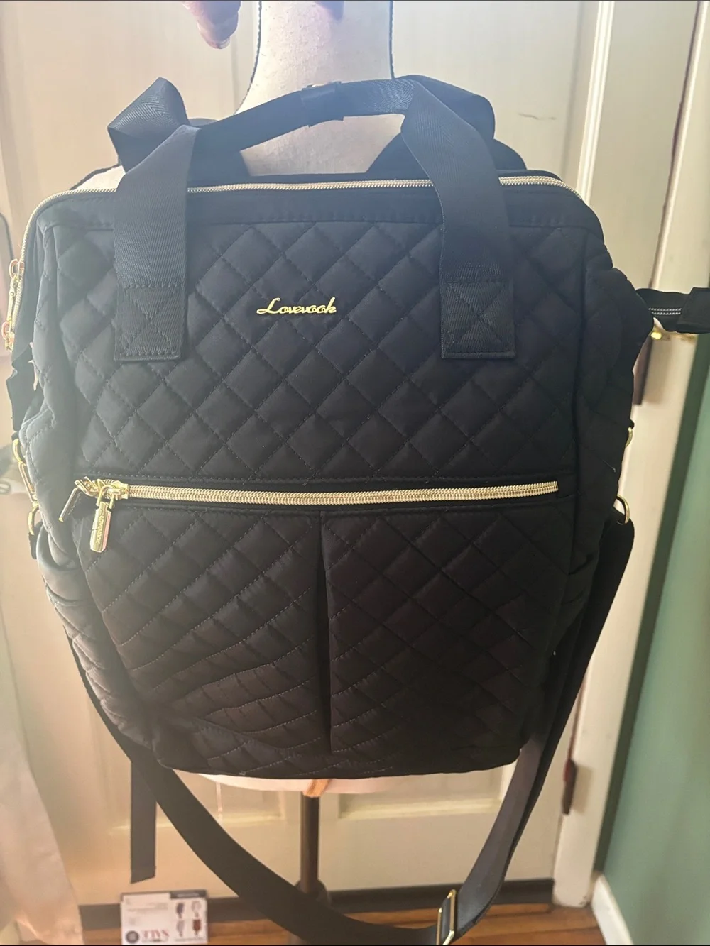 Stylish Quilted Black Backpack with Gold Hardware